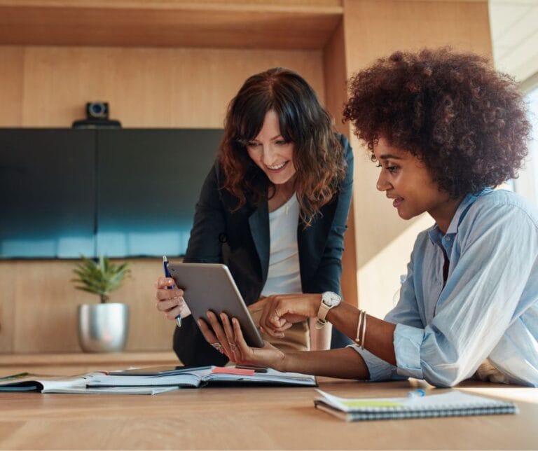 two women with health insurance