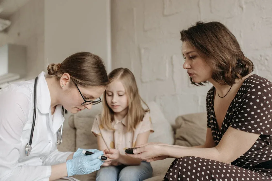 a doctor checking a child