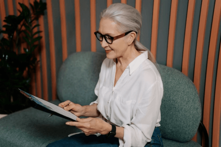 An image of a Dallas woman looking at some papers