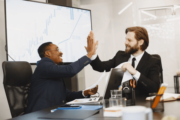 Two people doing a high-five