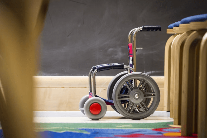 close-up of a wheelchair with grey tires