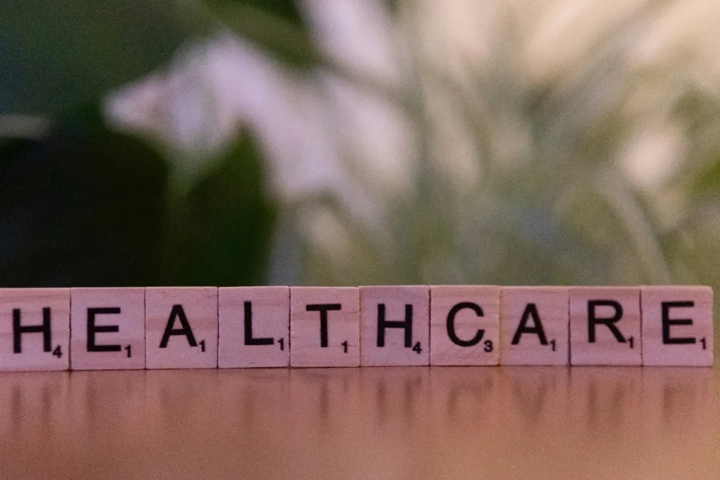 “Healthcare” written on scrabble tiles