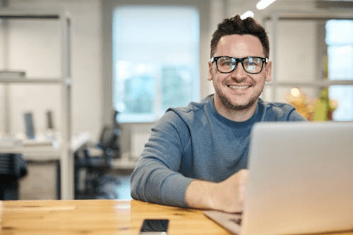 Self-employed professional working on a laptop