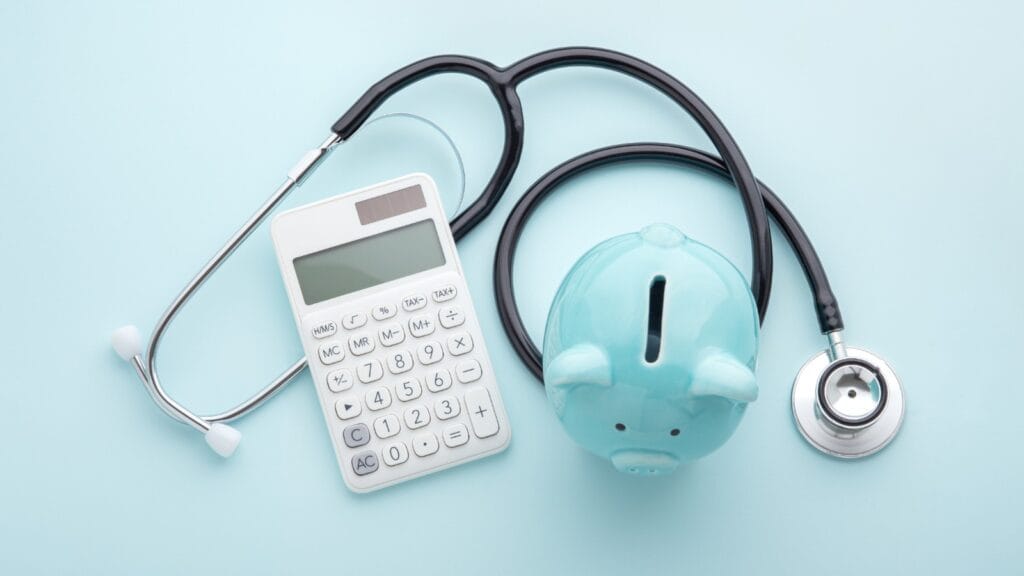 HSA Plans in Texas image showing a piggy bank calculator and stethoscope.