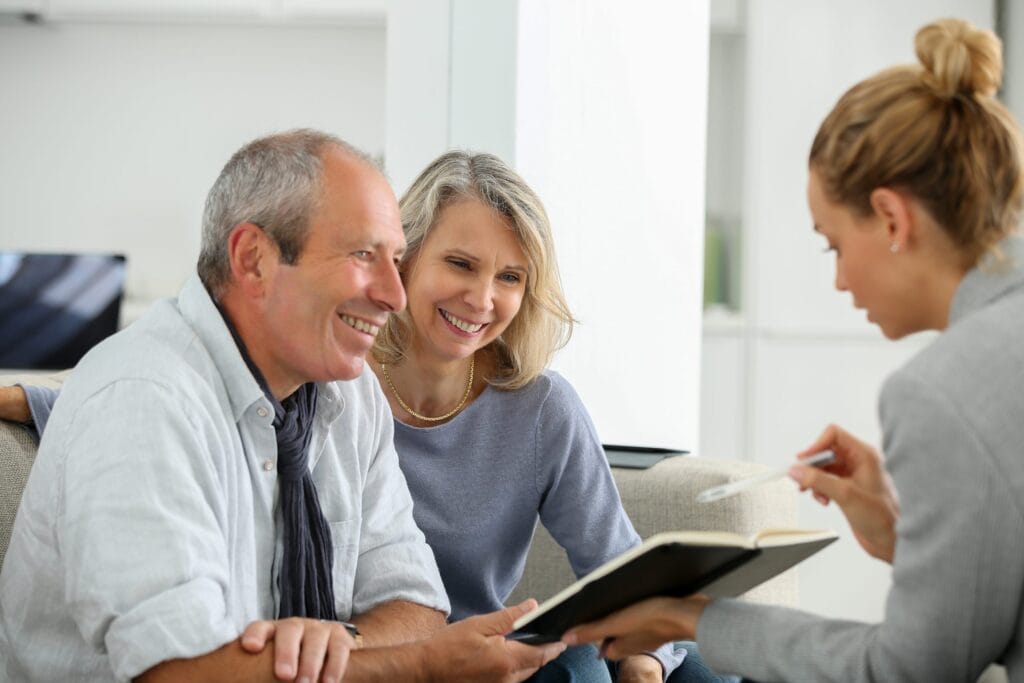 Life Insurance Plans in Texas image showing senior couple discussing final expense coverage with advisor today.