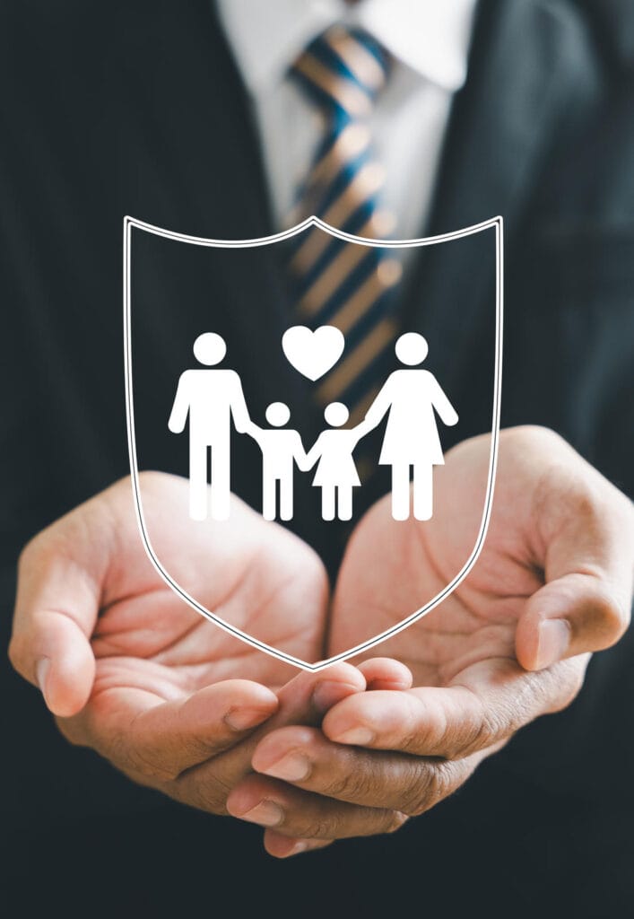 Life Insurance Plans in Texas image showing family icon protected inside shield symbol held in hands securely.